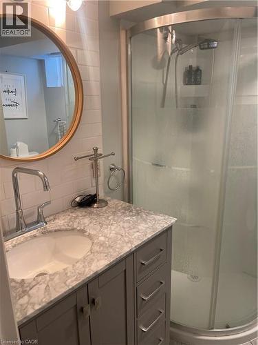 Full bathroom featuring tasteful backsplash, vanity, and a stall shower - 229 Pine Glen Crescent, Kitchener, ON - Indoor Photo Showing Bathroom
