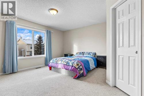 176 Cougar Ridge Circle Sw, Calgary, AB - Indoor Photo Showing Bedroom
