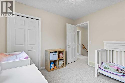 176 Cougar Ridge Circle Sw, Calgary, AB - Indoor Photo Showing Bedroom
