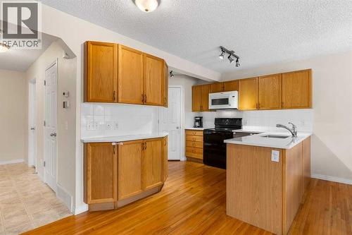 176 Cougar Ridge Circle Sw, Calgary, AB - Indoor Photo Showing Kitchen