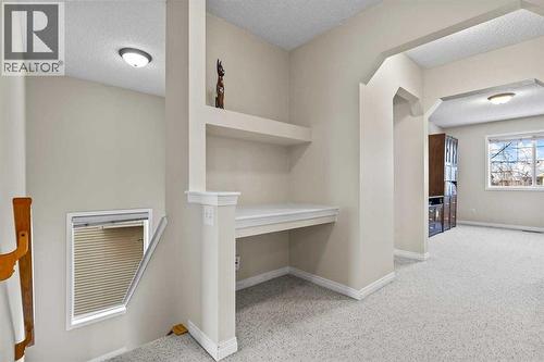 176 Cougar Ridge Circle Sw, Calgary, AB - Indoor Photo Showing Other Room