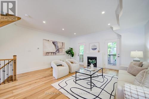 2 - 111 Wilson Street E, Hamilton, ON - Indoor Photo Showing Living Room With Fireplace