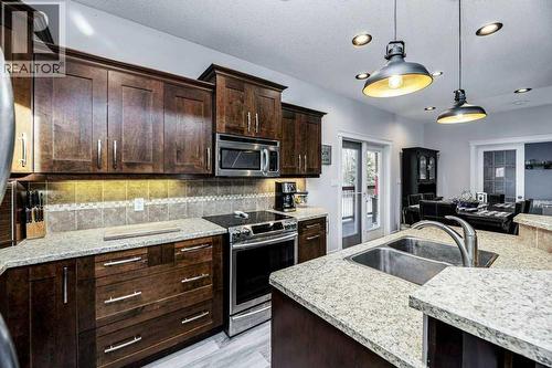 462054 11 Range Road Range, Westerose, AB - Indoor Photo Showing Kitchen With Double Sink With Upgraded Kitchen