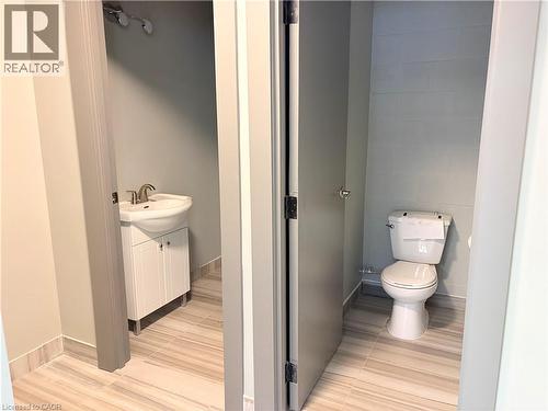 Bathroom featuring vanity and tile walls - 354 King Street N Unit# 3, Waterloo, ON 