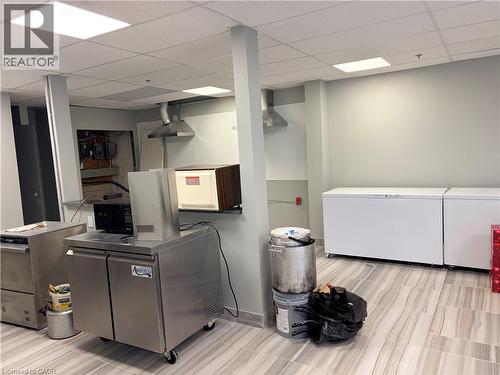 Laundry area featuring a paneled ceiling - 354 King Street N Unit# 3, Waterloo, ON 