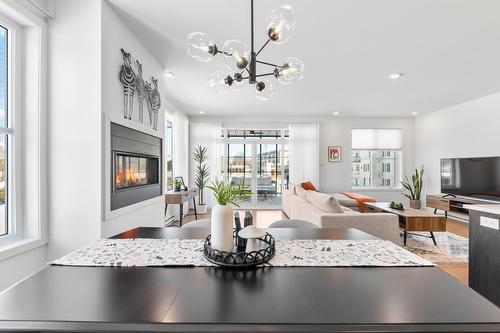 Vue d'ensemble - 201-180 34E Rue O., Venise-En-Québec, QC - Indoor Photo Showing Other Room With Fireplace