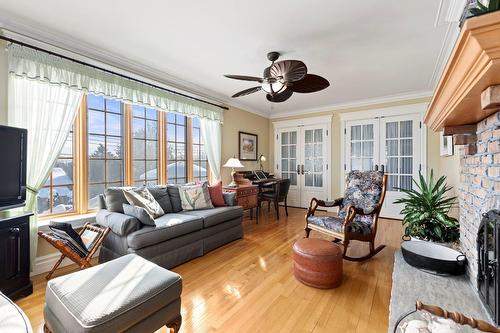 Family room - 315 Rue Boivin, Montréal (L'Île-Bizard/Sainte-Geneviève), QC - Indoor Photo Showing Living Room With Fireplace