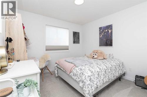 308 Grassland Boulevard W, Lethbridge, AB - Indoor Photo Showing Bedroom