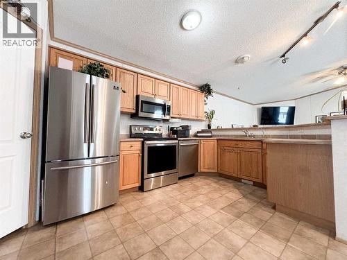9009 90 Avenue, Grande Prairie, AB - Indoor Photo Showing Kitchen