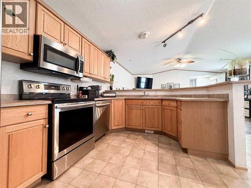9009 90 Avenue, Grande Prairie, AB - Indoor Photo Showing Kitchen