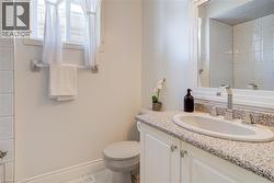 Bathroom with baseboards and vanity - 