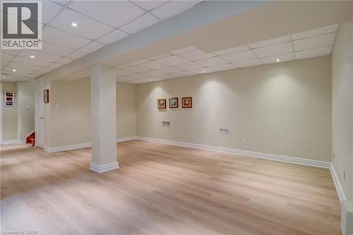 Finished below grade area featuring recessed lighting, a paneled ceiling, and light wood finished floors - 15 Claudette Gate, Hamilton, ON - Indoor