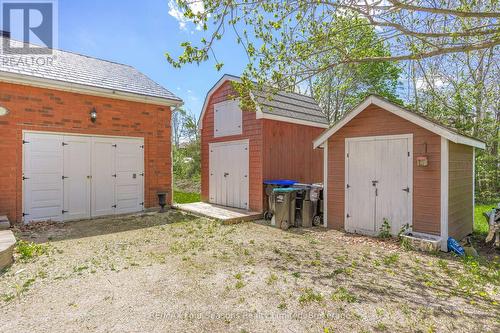 Attached Garage, 2 sheds - 3 Sydenham Trail E, Clearview, ON - Outdoor With Exterior