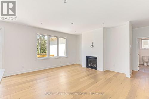 60 52Nd Street S, Wasaga Beach, ON - Indoor Photo Showing Living Room With Fireplace