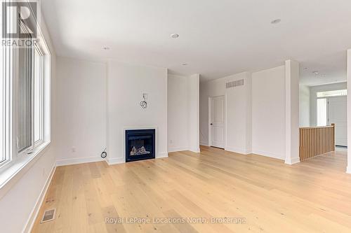 60 52Nd Street S, Wasaga Beach, ON - Indoor Photo Showing Living Room With Fireplace