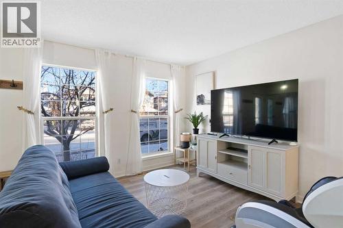 393 Tuscany Valley View Nw, Calgary, AB - Indoor Photo Showing Living Room