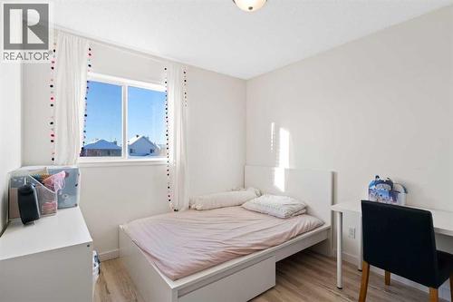 393 Tuscany Valley View Nw, Calgary, AB - Indoor Photo Showing Bedroom