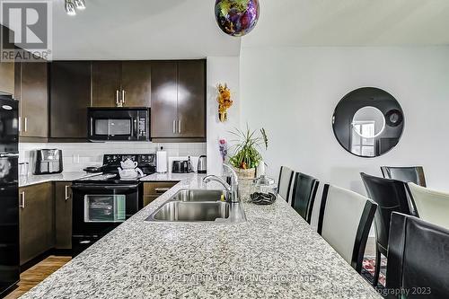 2203 - 60 Absolute Avenue, Mississauga, ON - Indoor Photo Showing Kitchen With Double Sink