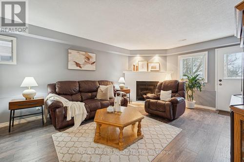 7 Empire Crescent, Clarington, ON - Indoor Photo Showing Living Room With Fireplace