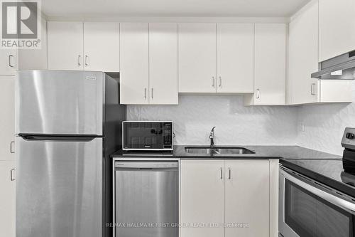 522 - 2791 Eglinton Avenue E, Toronto, ON - Indoor Photo Showing Kitchen With Stainless Steel Kitchen With Double Sink