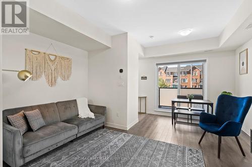 522 - 2791 Eglinton Avenue E, Toronto, ON - Indoor Photo Showing Living Room