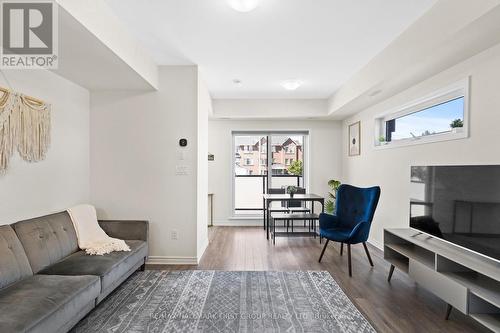 522 - 2791 Eglinton Avenue E, Toronto, ON - Indoor Photo Showing Living Room