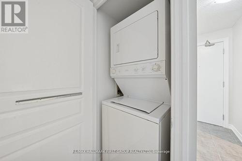 406 - 1600 Charles Street, Whitby, ON - Indoor Photo Showing Laundry Room