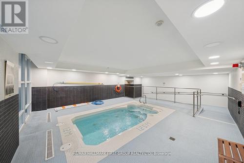 406 - 1600 Charles Street, Whitby, ON - Indoor Photo Showing Other Room With In Ground Pool