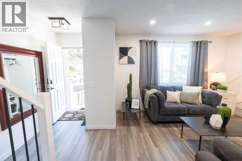 6223 Penedo Way Se, Calgary, AB - Indoor Photo Showing Living Room