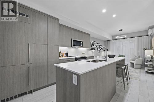 213, 310 15 Avenue SW  Calgary, AB T2R 1S9