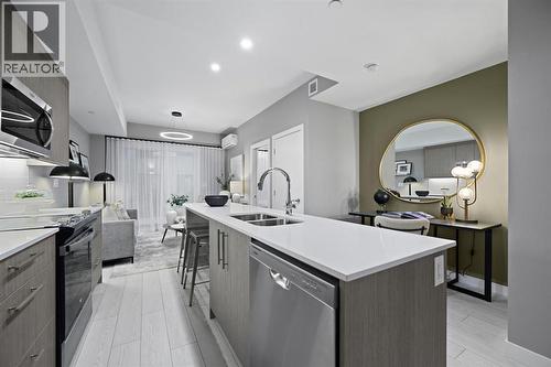 213, 310 15 Avenue Sw, Calgary, AB - Indoor Photo Showing Kitchen With Double Sink