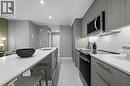 213, 310 15 Avenue Sw, Calgary, AB  - Indoor Photo Showing Kitchen With Upgraded Kitchen 