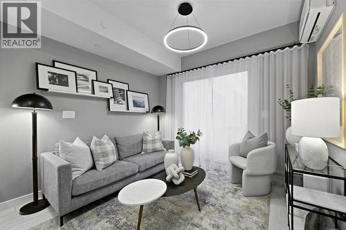 213, 310 15 Avenue Sw, Calgary, AB - Indoor Photo Showing Living Room