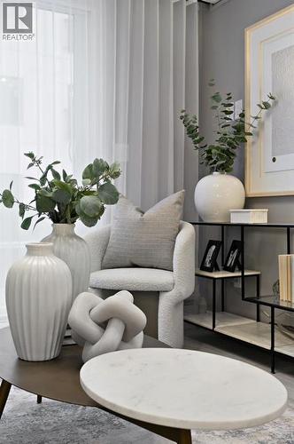 213, 310 15 Avenue Sw, Calgary, AB - Indoor Photo Showing Living Room