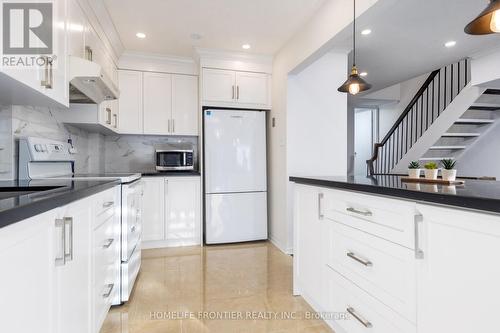 64 Flaming Roseway, Toronto, ON - Indoor Photo Showing Kitchen