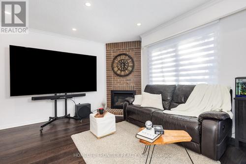 64 Flaming Roseway, Toronto, ON - Indoor Photo Showing Living Room With Fireplace