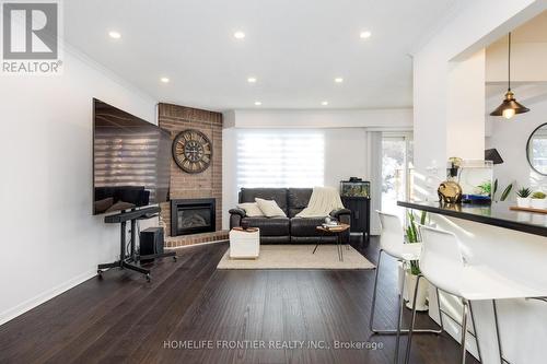 64 Flaming Roseway, Toronto, ON - Indoor With Fireplace