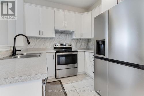 34 Milne Street, New Tecumseth, ON - Indoor Photo Showing Kitchen With Stainless Steel Kitchen With Double Sink