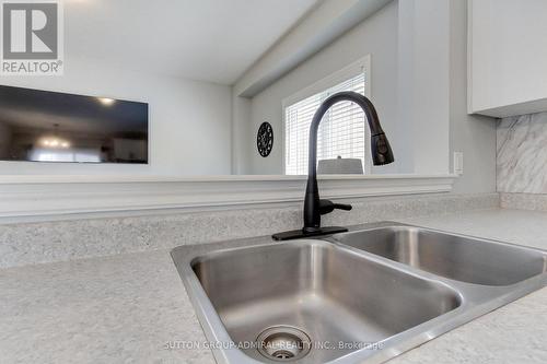 34 Milne Street, New Tecumseth, ON - Indoor Photo Showing Kitchen With Double Sink