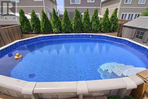 34 Milne Street, New Tecumseth, ON - Outdoor With Above Ground Pool