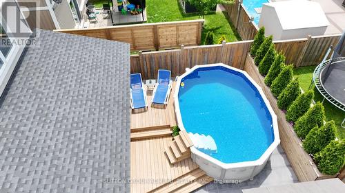 34 Milne Street, New Tecumseth, ON - Outdoor With Above Ground Pool With Deck Patio Veranda