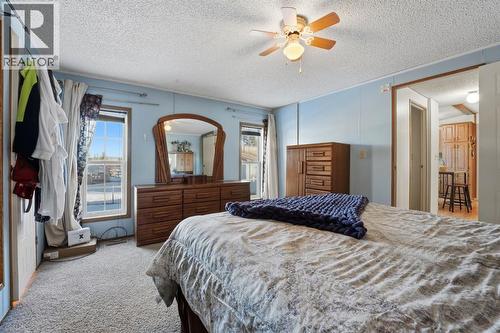 #47, 33009 Range Road 55, Rural Mountain View County, AB - Indoor Photo Showing Bedroom