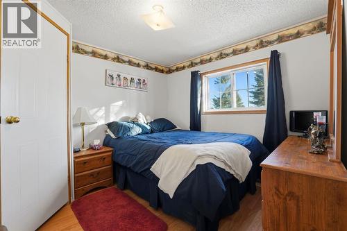 #47, 33009 Range Road 55, Rural Mountain View County, AB - Indoor Photo Showing Bedroom