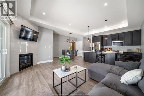 410 Caserta Crescent, Lakeshore, ON - Indoor Photo Showing Living Room With Fireplace