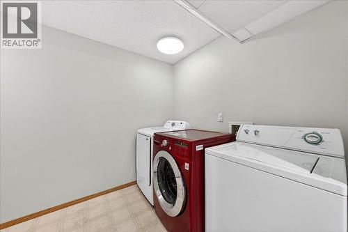 laundry room - 137 Woodbrook Road Sw, Calgary, AB - Indoor Photo Showing Laundry Room