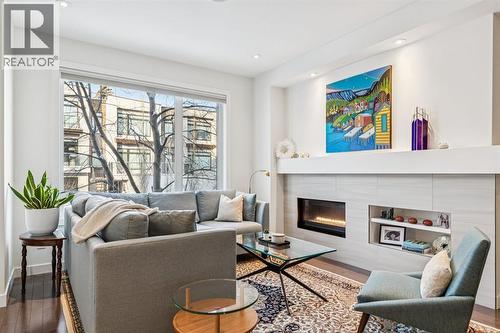 2924 15 Street Sw, Calgary, AB - Indoor Photo Showing Living Room With Fireplace