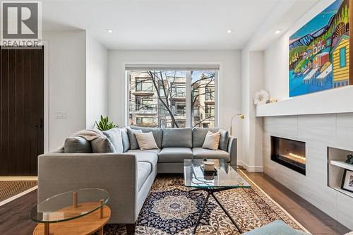 2924 15 Street Sw, Calgary, AB - Indoor Photo Showing Living Room With Fireplace