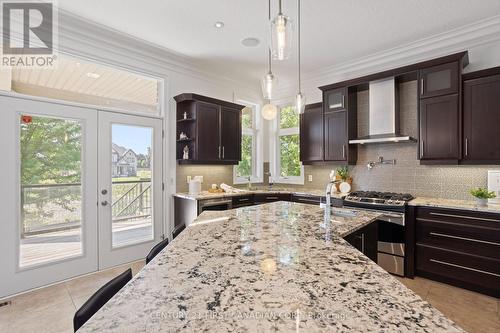 7071 Clayton Walk, London South (South V), ON - Indoor Photo Showing Kitchen With Double Sink With Upgraded Kitchen
