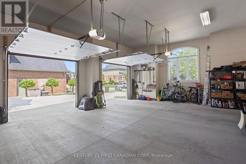 7071 Clayton Walk, London South (South V), ON - Indoor Photo Showing Garage