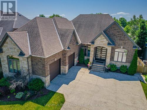 7071 Clayton Walk, London South (South V), ON - Outdoor With Facade